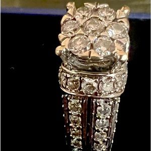 Engagement ring size 7. The diamonds in total are 1 carat with white gold.